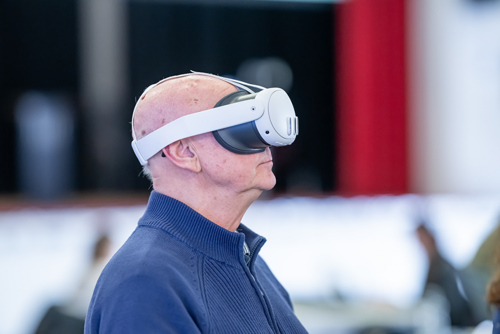 elderly gentleman wearing VR headset