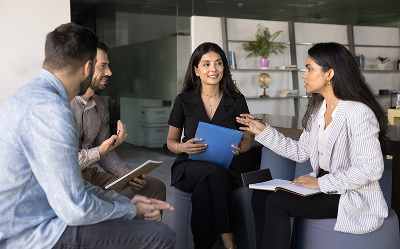 group in discussion with one person leading