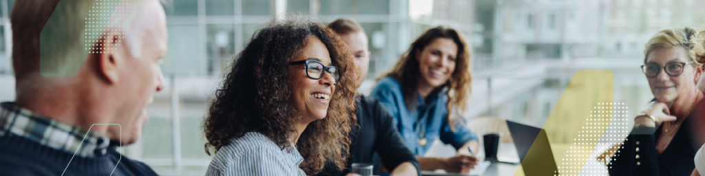 people conversing round a table