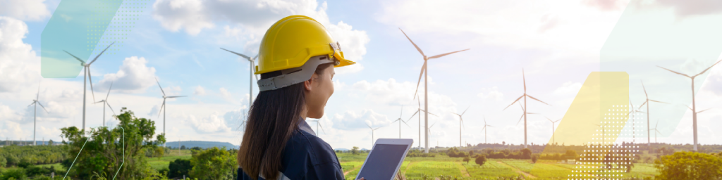 person in hard hat at a wind farm